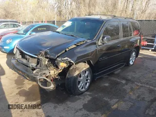 2006 GMC Envoy Denali with VIN 1GKET63M962355586, listed as a IAAI auction lot 41881023 with 235,506 mi miles. Bid and sale history available at carsss.com. Image 2.