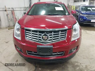 2014 Cadillac SRX Performance Collection z VIN 3GYFNCE30ES596415, wystawiony jako IAAI lot #42329771 z przebiegiem 71 620 mil mil oraz . Historia ofert i sprzedaży dostępna na DreamBid. Obrazek 12.