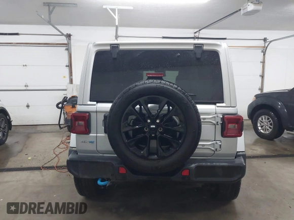 2024 Jeep Wrangler Sahara with VIN 1C4RJXP63RW202929, listed as a IAAI auction lot 41002346 with 12,332 mi miles and . Bid and sale history available at DreamBid. Image 17.