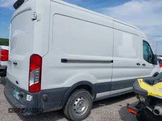 2019 Ford Transit with VIN 1FTYR2CM3KKB86806, listed as a IAAI auction lot 42633294 with 148,555 mi miles and . Bid and sale history available at DreamBid. Image 4.