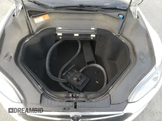 2014 Tesla Model S 60 с VIN 5YJSA1H18EFP33284, выставлен на аукционе Copart как лот 57434905 с пробегом 156 750 миль миль и Списание • Salvage title. История ставок и продаж доступна на DreamBid. Изображение 11.