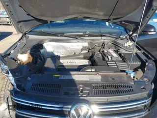 2014 Volkswagen Tiguan S z VIN WVGBV3AX4EW581302, wystawiony jako IAAI lot #41033175 z przebiegiem 69 791 mil mil oraz . Historia ofert i sprzedaży dostępna na DreamBid. Obrazek 10.