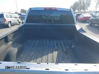 2014 Chevrolet Silverado 1500 with VIN 1GCNCREH2EZ303297, listed as a IAAI auction lot 41692877 with 115,621 mi miles and . Bid and sale history available at DreamBid. Image 8.