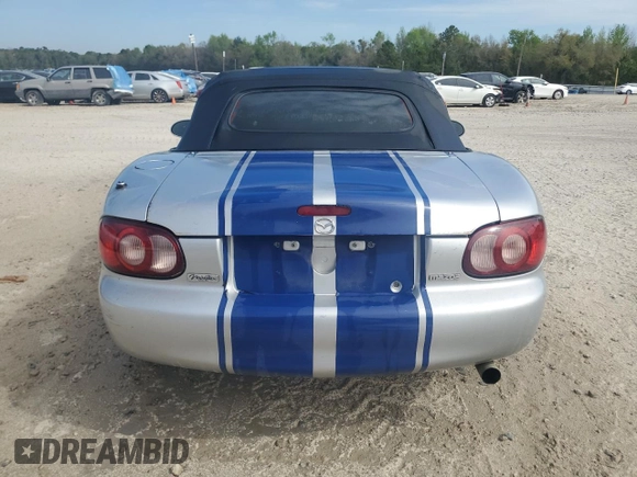 2003 Mazda MX-5 Miata Cloth with VIN JM1NB353430304103, listed as a Copart auction lot 50574245 with Not provided miles and Salvage title. Bid and sale history available at DreamBid. Image 6.
