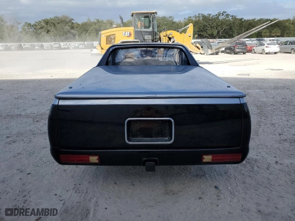 1986 Chevrolet El Camino with VIN 3GCCW80H7GS909081, listed as a Copart auction lot 76185614 with NaN miles and Salvage Title. Bid and sale history available at carsss.com. Image 6.