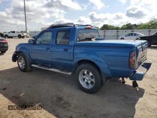 2003 Nissan Frontier XE z VIN 1N6ED27TX3C434061, wystawiony jako Copart lot #56834655 z przebiegiem 208 857 mil mil oraz Szkody całkowita. Historia ofert i sprzedaży dostępna na DreamBid. Obrazek 2.