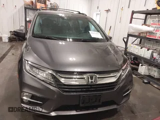 2018 Honda Odyssey Touring with VIN 5FNRL6H84JB041309, listed as a IAAI auction lot 42272247 with 90,371 mi miles and . Bid and sale history available at DreamBid. Image 12.