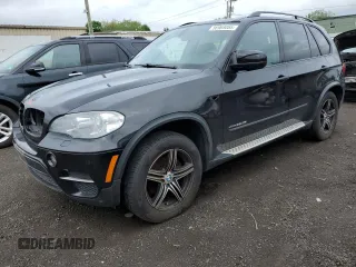 2012 BMW X5 35i z VIN 5UXZV4C50CL762916, wystawiony jako Copart lot #56969055 z przebiegiem 155 805 mil mil oraz Szkoda całkowita • Salvage title. Historia ofert i sprzedaży dostępna na DreamBid. Obrazek 1.