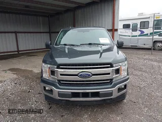 2018 Ford F-150 XL with VIN 1FTEW1EG4JKE17790, listed as a IAAI auction lot 42128519 with 153,740 mi miles. Bid and sale history available at carsss.com. Image 12.