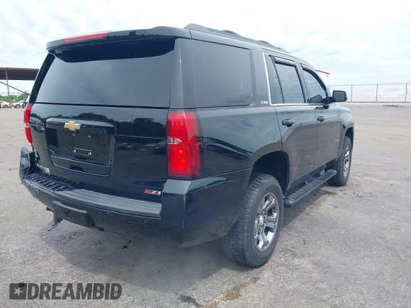 2017 Chevrolet Tahoe LT z VIN 1GNSKBKC8HR311969, wystawiony jako IAAI lot #42126414 z przebiegiem 160 994 mil mil oraz . Historia ofert i sprzedaży dostępna na DreamBid. Obrazek 4.