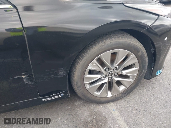 2021 Toyota Mirai XLE with VIN JTDAAAAA1MA002323, listed as a IAAI auction lot 42034157 with 16,592 mi miles and . Bid and sale history available at carsss.com. Image 6.