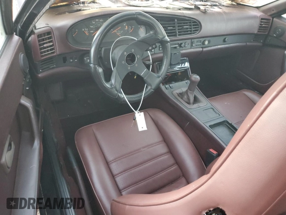 1986 Porsche 944 with VIN WP0AA0951GN156691, listed as a Copart auction lot 79901794 with 694,360 mi miles and Salvage Title. Bid and sale history available at DreamBid. Image 8.