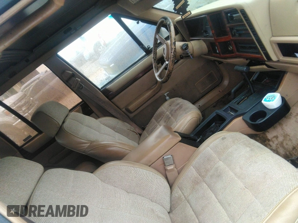 1993 Jeep Cherokee Country with VIN 1J4FJ78S0PL519025, listed as a IAAI auction lot 42409707 with 162,231 mi miles and . Bid and sale history available at DreamBid. Image 5.