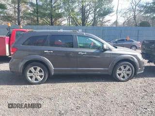 2016 Dodge Journey SXT with VIN 3C4PDDBG3GT118383, listed as a IAAI auction lot 41801212 with 136,068 mi miles and . Bid and sale history available at carsss.com. Image 13.