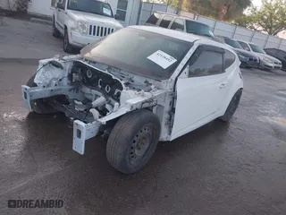 2017 Hyundai Veloster with VIN KMHTC6AD2HU312538, listed as a IAAI auction lot 42128452 with 1 mi miles. Bid and sale history available at carsss.com. Image 2.