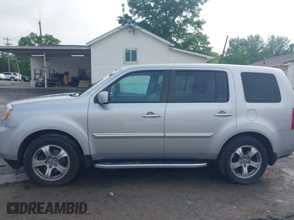 2015 Honda Pilot EX-L with VIN 5FNYF4H5XFB014653, listed as a IAAI auction lot 42121003 with 152,912 mi miles and . Bid and sale history available at carsss.com. Image 15.