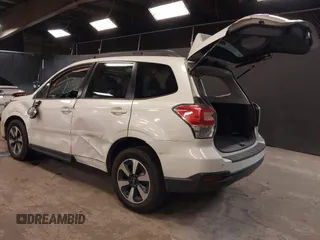 2018 Subaru Forester Premium with VIN JF2SJAEC6JH547549, listed as a IAAI auction lot 42050065 with 86,854 mi miles and . Bid and sale history available at DreamBid. Image 3.
