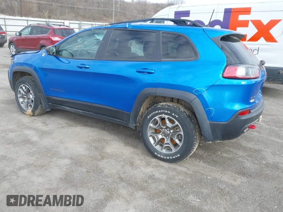 2022 Jeep Cherokee Trailhawk z VIN 1C4PJMBX1ND539319, wystawiony jako IAAI lot #41811178 z przebiegiem 49 922 mil mil oraz . Historia ofert i sprzedaży dostępna na DreamBid. Obrazek 3.
