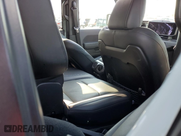 2024 Jeep Wrangler Rubicon with VIN 1C4RJXR61RW255979, listed as a Copart auction lot 43451095 with 7,258 mi miles and Salvage title. Bid and sale history available at DreamBid. Image 11.