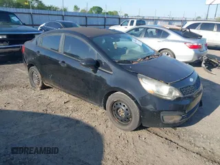 2013 Kia Rio LX with VIN KNADM4A37D6232777, listed as a IAAI auction lot 42002568 with 168,336 mi miles. Bid and sale history available at carsss.com. Image 1.