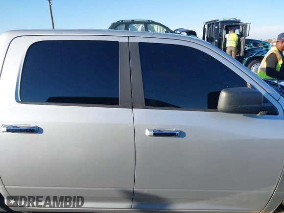 2014 Ram 1500 Big Horn with VIN 1C6RR6LT1ES180291, listed as a IAAI auction lot 40962366 with 131,763 mi miles and . Bid and sale history available at DreamBid. Image 14.
