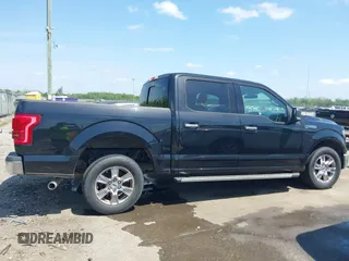 2015 Ford F-150 XL with VIN 1FTEW1CFXFFA37573, listed as a IAAI auction lot 42054120 with 125,822 mi miles. Bid and sale history available at carsss.com. Image 13.