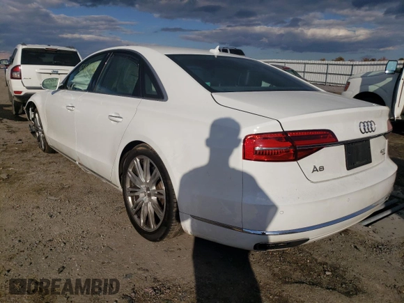 2015 Audi A8 4.0T with VIN WAUJ2AFD3FN005524, listed as a Copart auction lot 65610982 with 105,627 mi miles and . Bid and sale history available at DreamBid. Image 3.