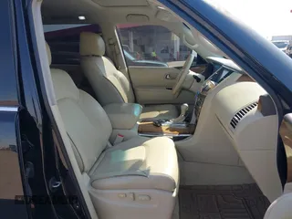 2012 Infiniti QX56 7-passenger with VIN JN8AZ2NF8C9518509, listed as a IAAI auction lot 42732292 with 165,844 mi miles and . Bid and sale history available at DreamBid. Image 5.