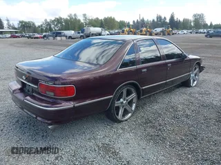 1994 Chevrolet Caprice LS z VIN 1G1BN52P2RR130218, wystawiony jako IAAI lot #42222080 z przebiegiem Nie podano mil oraz . Historia ofert i sprzedaży dostępna na DreamBid. Obrazek 4.