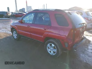 2009 Kia Sportage LX with VIN KNDJE723997634014, listed as a IAAI auction lot 41452224 with 148,643 mi miles. Bid and sale history available at carsss.com. Image 3.