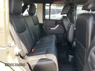 2015 Jeep Wrangler Unlimited Wrangler X with VIN 1C4BJWEG4FL754492, listed as a Copart auction lot 55305825 with 108,078 mi miles and Salvage title. Bid and sale history available at DreamBid. Image 11.