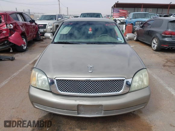 2003 Cadillac DeVille z VIN 1G6KD54Y63U223640, wystawiony jako IAAI lot #41704549 z przebiegiem 127 981 mil mil oraz . Historia ofert i sprzedaży dostępna na DreamBid. Obrazek 12.