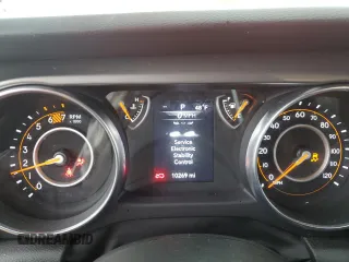 2023 Jeep Wrangler Sport Altitude with VIN 1C4HJXDG7PW675321, listed as a Copart auction lot 45138765 with 10,269 mi miles and Salvage Title. Bid and sale history available at DreamBid. Image 9.