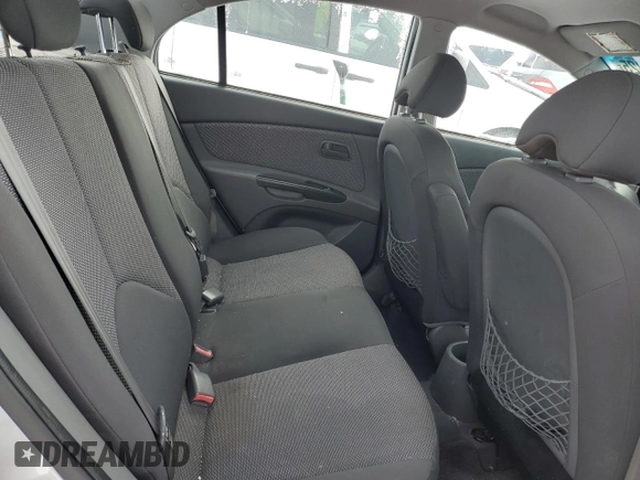 2010 Kia Rio with VIN KNADH4B38A6595734, listed as a Copart auction lot 46349825 with Not Provided miles and Salvage Title. Bid and sale history available at DreamBid. Image 10.