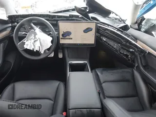 2022 Tesla Model 3 Performance with VIN 5YJ3E1EC7NF306192, listed as a IAAI auction lot 41453931 with 36,450 mi miles. Bid and sale history available at carsss.com. Image 5.
