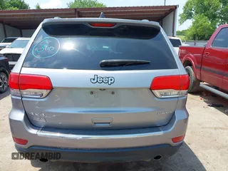 2014 Jeep Grand Cherokee Limited with VIN 1C4RJFBG4EC589321, listed as a IAAI auction lot 42335043 with 153,428 mi miles and . Bid and sale history available at DreamBid. Image 17.