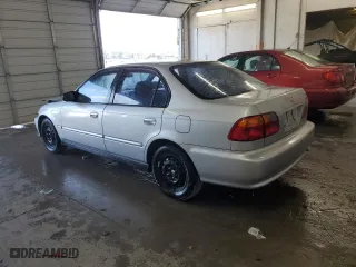 1999 Honda Civic VP with VIN 2HGEJ6617XH594440, listed as a Copart auction lot 70272194 with 200,639 mi miles and Salvage Title. Bid and sale history available at carsss.com. Image 2.