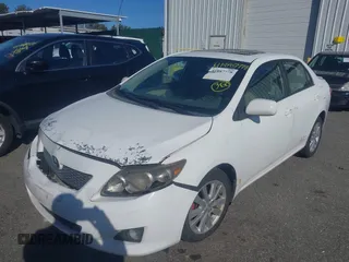 2009 Toyota Corolla with VIN 1NXBU40E59Z070160, listed as a IAAI auction lot 41887778 with 185,133 mi miles. Bid and sale history available at carsss.com. Image 2.