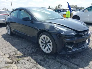 2022 Tesla Model 3 with VIN 5YJ3E1EA4NF316127, listed as a IAAI auction lot 41939191 with 30,857 mi miles. Bid and sale history available at carsss.com. Image 1.