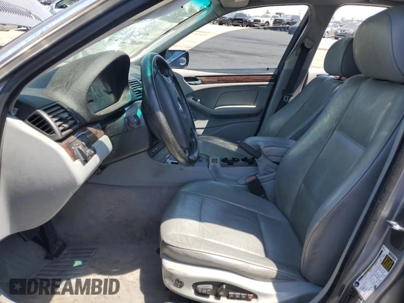 2005 BMW 3 Series 330i with VIN WBAEV53485KM39295, listed as a Copart auction lot 61581235 with 185,054 mi miles and Salvage title. Bid and sale history available at DreamBid. Image 7.