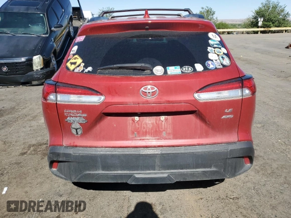2022 Toyota Corolla Cross LE with VIN 7MUCAABG8NV008867, listed as a Copart auction lot 57232415 with 48,670 mi miles and Salvage title. Bid and sale history available at DreamBid. Image 6.