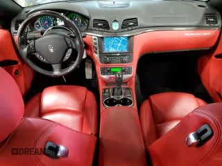2012 Maserati GranTurismo Sport с VIN ZAM45MMA3C0061663, выставлен на аукционе Copart как лот 71174774 с пробегом 14 624 миль миль и Списание • Salvage title. История ставок и продаж доступна на DreamBid. Изображение 8.