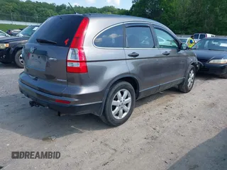 2011 Honda CR-V SE with VIN 5J6RE4H43BL089811, listed as a IAAI auction lot 42144060 with 212,559 mi miles and . Bid and sale history available at carsss.com. Image 4.