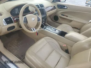 2012 Jaguar XK with VIN SAJWA4GB4CLB45121, listed as a Copart auction lot 79323684 with 0 mi miles and Salvage Title. Bid and sale history available at carsss.com. Image 8.