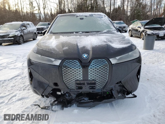 2025 BMW iX xDrive50 with VIN WB523CF04SCT20220, listed as a Copart auction lot 83225094 with 0 mi miles and Salvage Title. Bid and sale history available at carsss.com. Image 5.