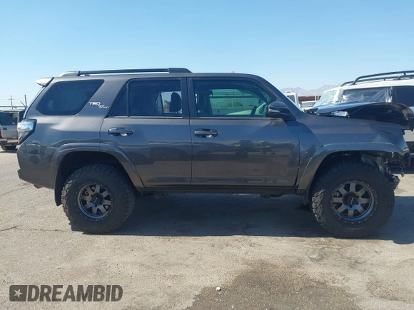 2021 Toyota 4Runner TRD Off Road Premium with VIN JTERU5JR3M5879360, listed as a IAAI auction lot 42338868 with 54,742 mi miles and . Bid and sale history available at DreamBid. Image 14.