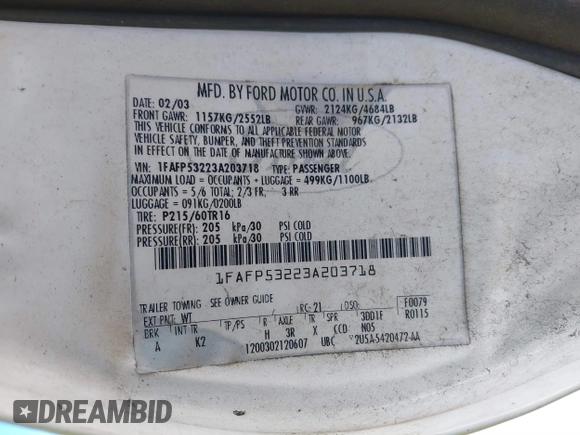 2003 Ford Taurus SE Standard with VIN 1FAFP53223A203718, listed as a IAAI auction lot 41708811 with 200,413 mi miles. Bid and sale history available at carsss.com. Image 9.