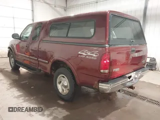 1998 Ford F-150 with VIN 1FTZX18W8WKA19037, listed as a IAAI auction lot 40977819 with 137,119 mi miles and . Bid and sale history available at DreamBid. Image 3.