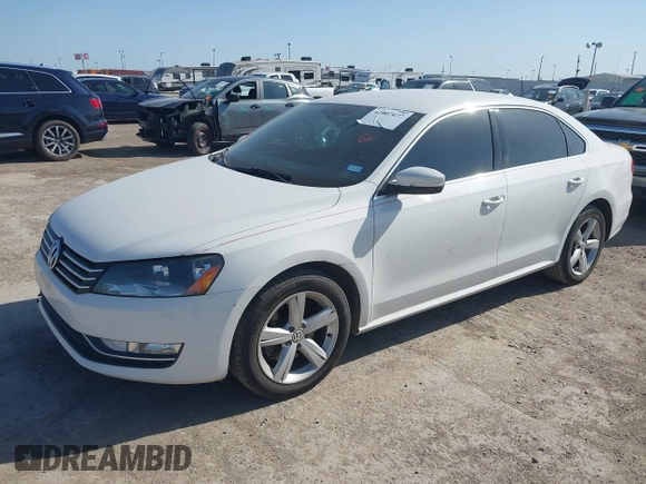 2015 Volkswagen Passat 1.8T Limited Edition with VIN 1VWAT7A34FC085880, listed as a IAAI auction lot 42007677 with 184,722 mi miles. Bid and sale history available at carsss.com. Image 2.