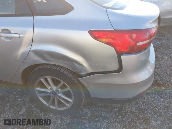 2017 Ford Focus SE with VIN 1FADP3F27HL321914, listed as a IAAI auction lot 40821776 with 87,689 mi miles and . Bid and sale history available at DreamBid. Image 6.